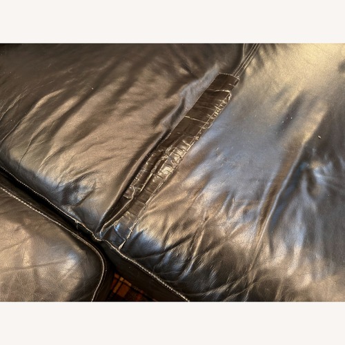 Used Black Leather 7 Cushion Sectional U-Shaped for sale on AptDeco