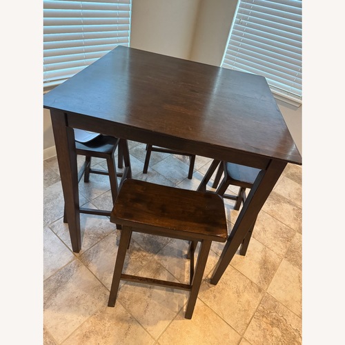 Used Dark Brown Dining Set for sale on AptDeco