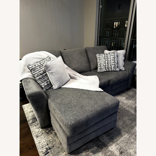 Used Ashley Furniture Dark Gray Sleeper Sofa for sale on AptDeco