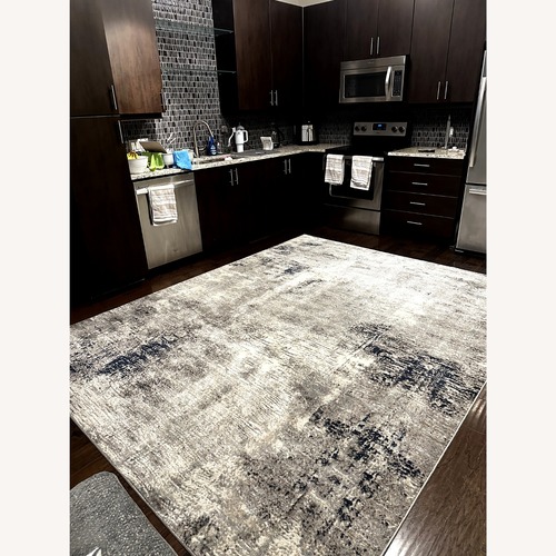 Used Ashley Furniture Brookhall 7'10" x 10'6" Rug for sale on AptDeco