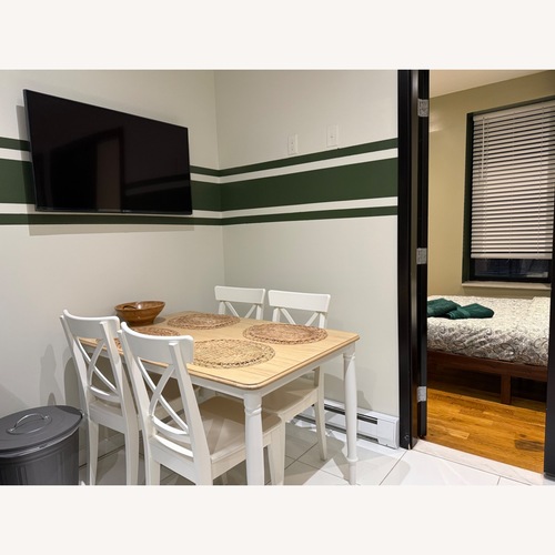 Used IKEA White Wood Dining Set for sale on AptDeco