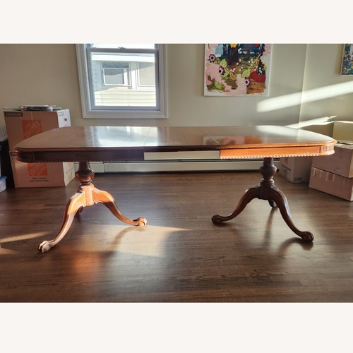 Used Vintage/Antique Finds Dark Brown Dining Table for sale on AptDeco