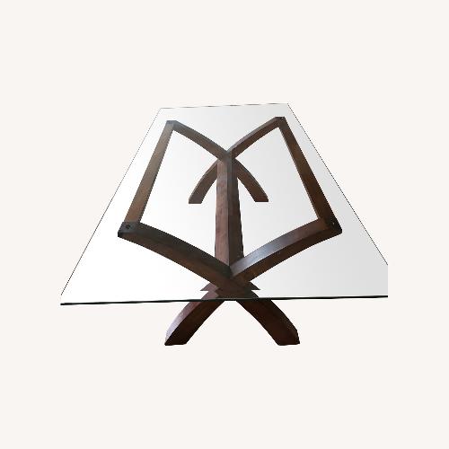 Used Light Brown Wood Dining Table for sale on AptDeco