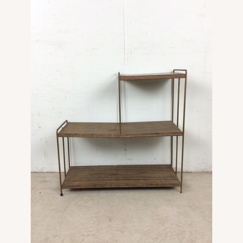 Used Mid Century Step Shelving with Faux Wood Print for sale on AptDeco