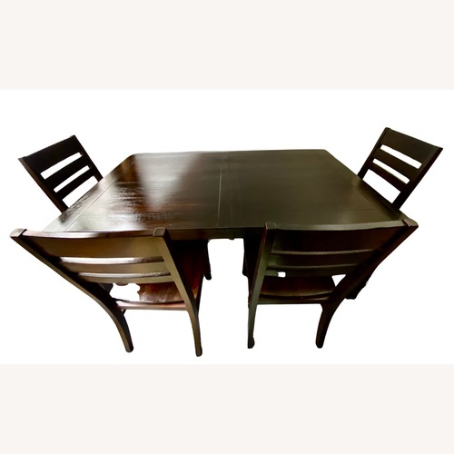 Used World Market Dark Brown Wood 6-Piece Dining Set for sale on AptDeco