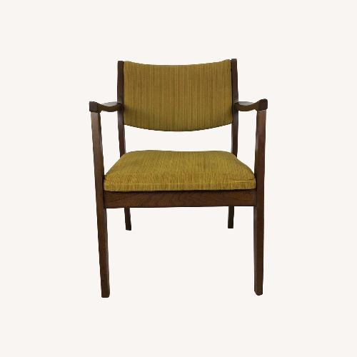 Used Mid Century Arm Chair with Vintage Upholstery for sale on AptDeco