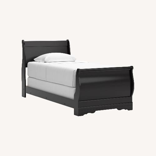 Used Ashley Furniture Black Twin Bed for sale on AptDeco