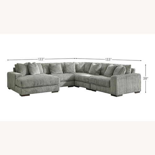 Used Raymour & Flanigan Dark Gray 3+ Piece Sectional for sale on AptDeco