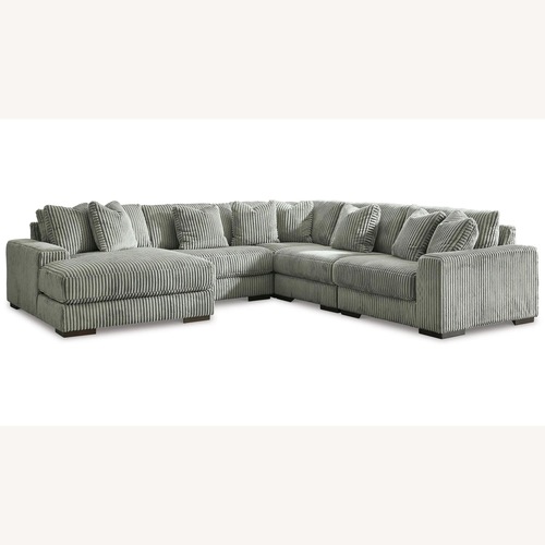 Used Raymour & Flanigan Dark Gray 3+ Piece Sectional for sale on AptDeco