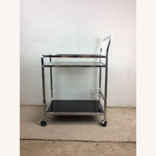 Used Postmodern Chrome & Glass Wheeled Bar Cart for sale on AptDeco