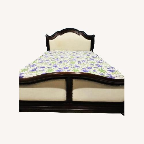 Used Raymour & Flanigan Dark Brown Wood King Bed for sale on AptDeco