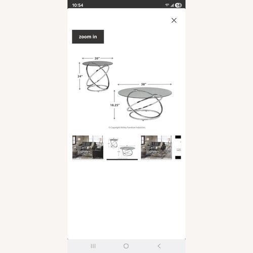 Used Ashley Furniture Glass Coffee Table for sale on AptDeco