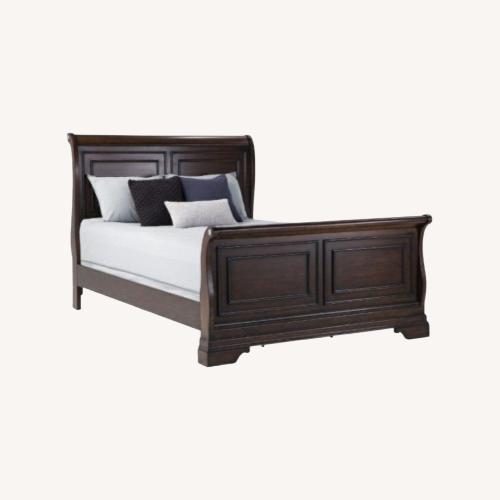 Used Bob's Discount Furniture Dark Brown Wood Full Bed for sale on AptDeco