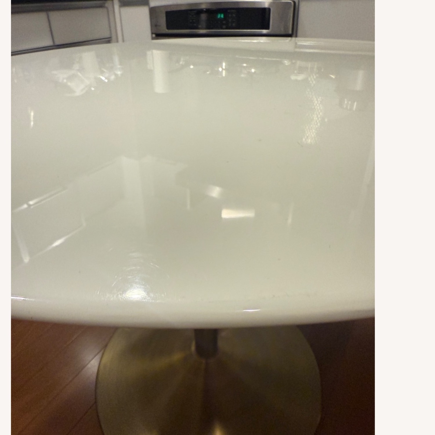 CB2 Odyssey Round White Dining Table w  Brass Base - image-2