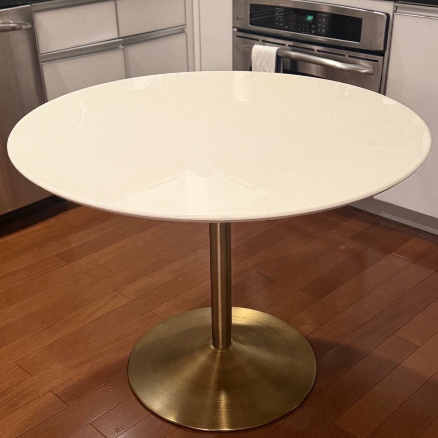 CB2 Odyssey Round White Dining Table w  Brass Base - image-4