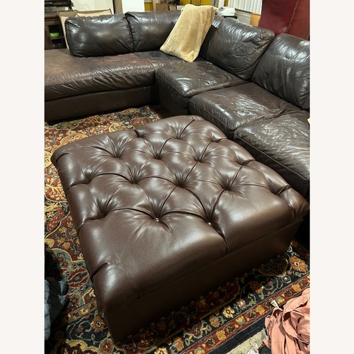 Used Dark Brown Leather Ottoman for sale on AptDeco