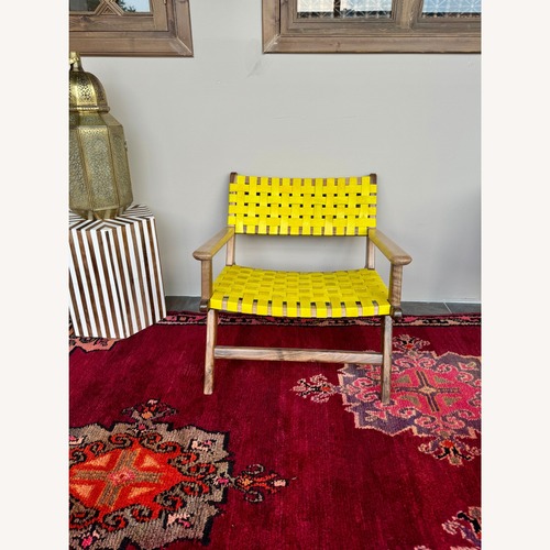 Used Dark Brown Wood Armchair for sale on AptDeco