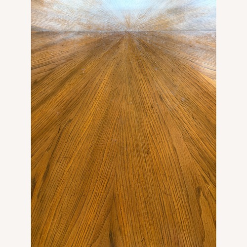 Used Dining Table with 3 Leaves and 4 Chairs for sale on AptDeco