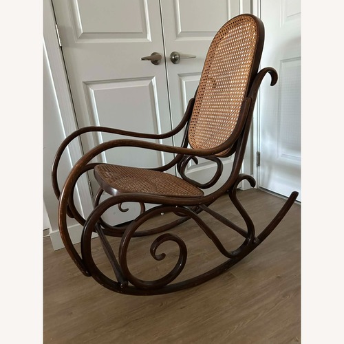 Used Vintage/Antique Finds Dark Brown Accent Chair for sale on AptDeco
