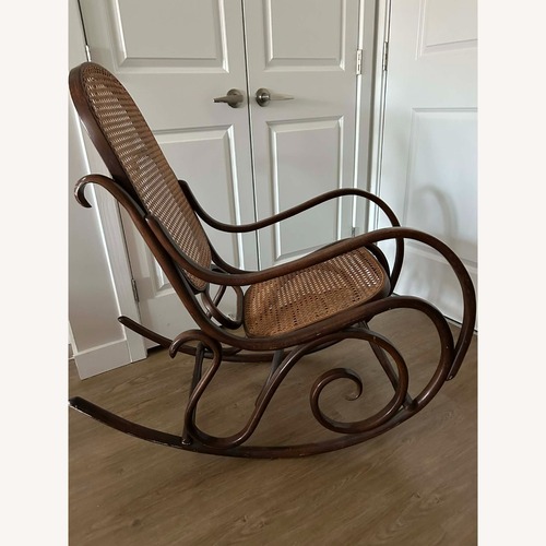 Used Vintage/Antique Finds Dark Brown Accent Chair for sale on AptDeco