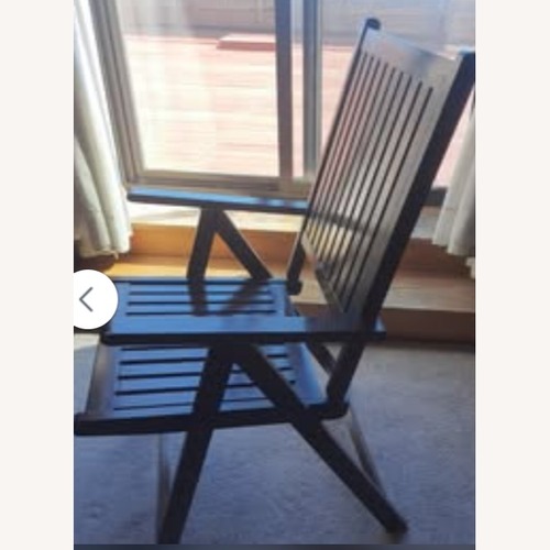 Used Dark Brown Wood Accent Chair for sale on AptDeco