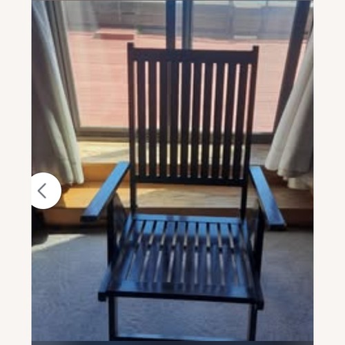 Used Dark Brown Wood Accent Chair for sale on AptDeco