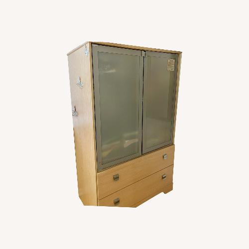 Used Natural Wood Armoire with Frosted Glass Doors for sale on AptDeco