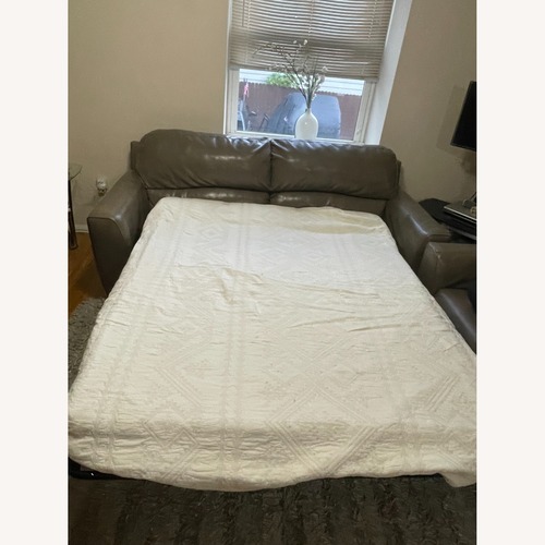 Used Ashley Furniture Natural Sleeper Sofa for sale on AptDeco