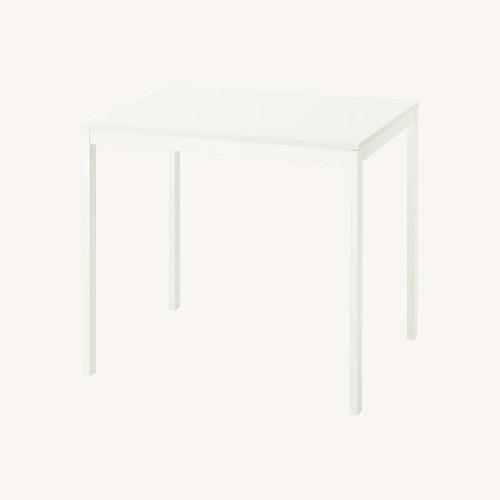 Used IKEA Vihals Dining Table White Wood Dining Table for sale on AptDeco