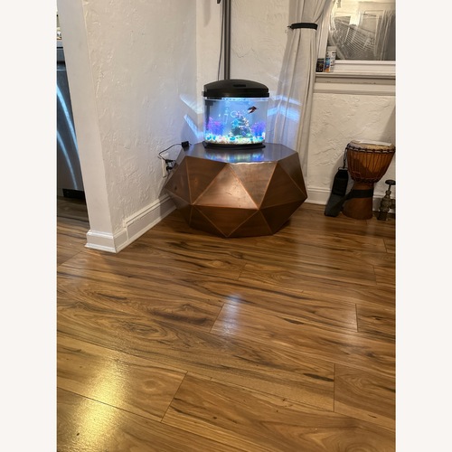 Used Safavieh Astrid Faceted Copper Coffee Table for sale on AptDeco