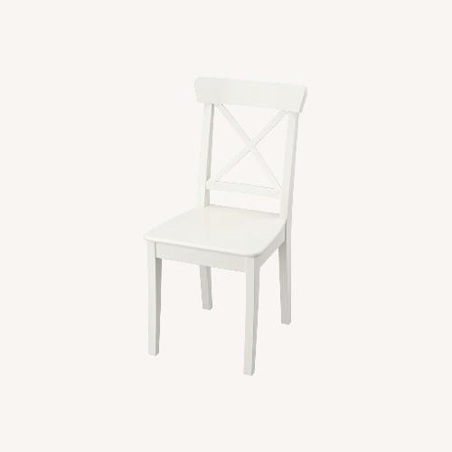 Used IKEA Ingolf White Wood Dining Chair for sale on AptDeco