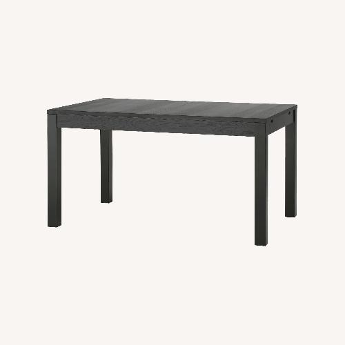 Used IKEA Black Bjursta Extendable Table for sale on AptDeco