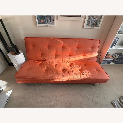 Used Ligne Roset Orange Futon for sale on AptDeco