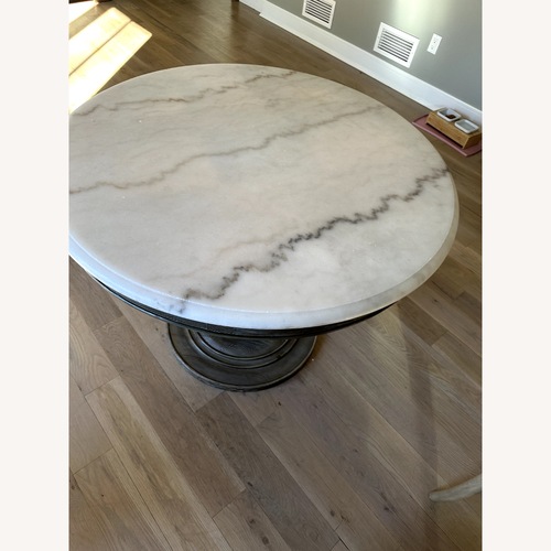 Used Arhaus Luca Light Gray Marble Dining Table for sale on AptDeco