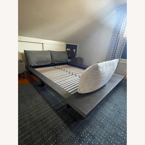 Used Ligne Roset Peter Maly Dark Brown Wood Queen Bed for sale on AptDeco