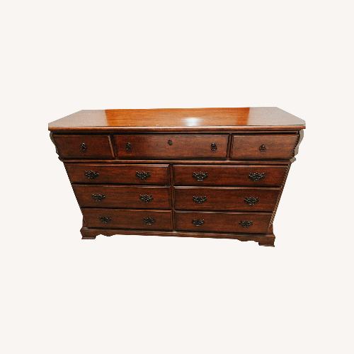 Used Vintage/Antique Finds Dark Brown Wood Dresser for sale on AptDeco