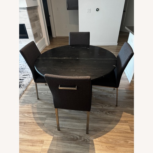 Used Black Dining Table for sale on AptDeco