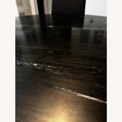 Used Black Dining Table for sale on AptDeco