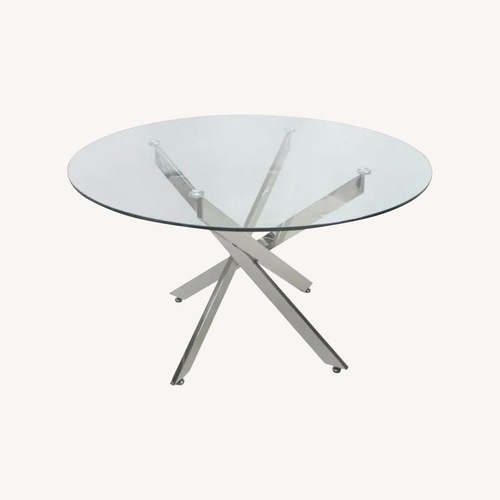 Used Chintaly Round Glass Dining Table for sale on AptDeco
