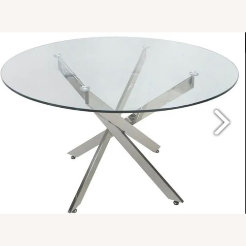 Used Chintaly Round Glass Dining Table for sale on AptDeco