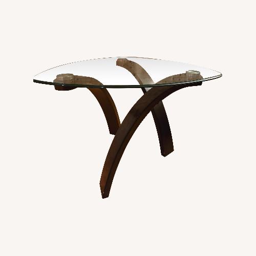 Used Ashley Furniture Dark Brown Glass Coffee Table for sale on AptDeco