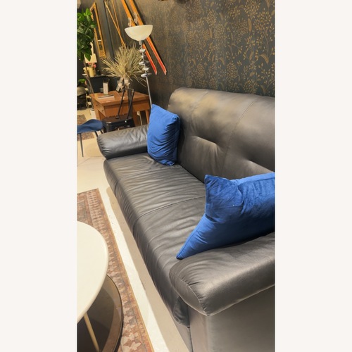 Used Vintage/Antique Black Leather 3+ Piece Sectional for sale on AptDeco
