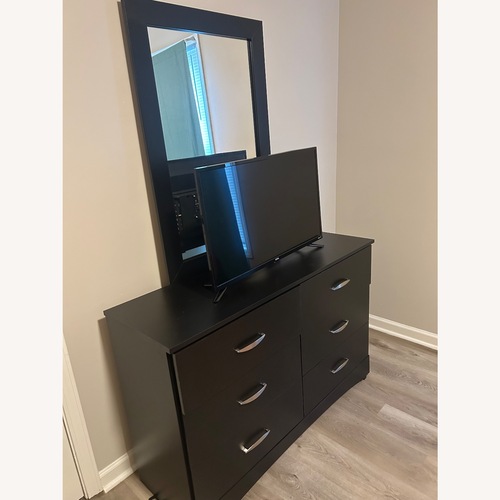Used Serena & Lily Black Wood Dresser for sale on AptDeco