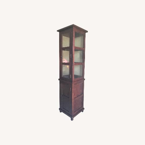 Used HD Buttercup Dark Brown Wood Cabinet for sale on AptDeco