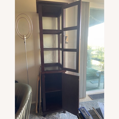 Used HD Buttercup Dark Brown Wood Cabinet for sale on AptDeco