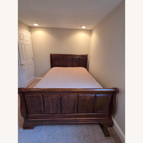 Used Dark Brown Queen Bed for sale on AptDeco