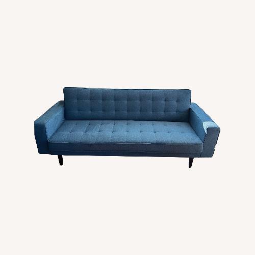 Used Living Spaces Mid-Century Modern Blue Futon Sofa for sale on AptDeco