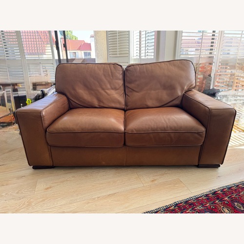 Used Natuzzi Dark Brown Loveseat for sale on AptDeco