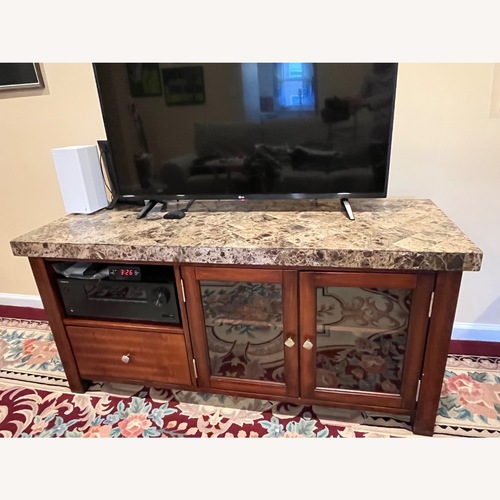 Used Bob's Discount Furniture Dark Brown TV Console for sale on AptDeco