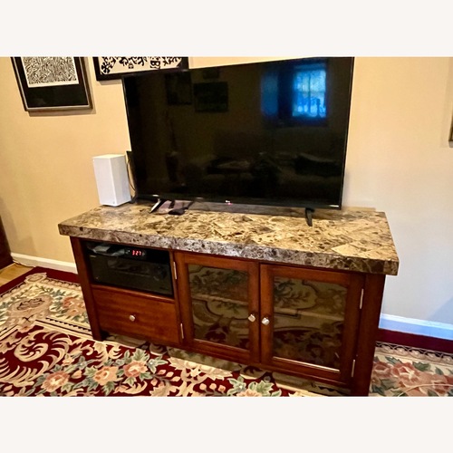 Used Bob's Discount Furniture Dark Brown TV Console for sale on AptDeco
